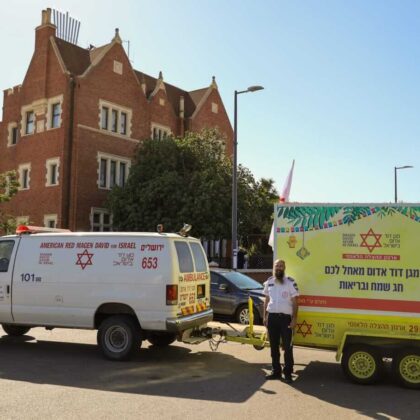 MDA brings traveling sukkah to cheer staff on Sukkot.