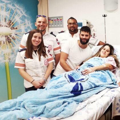 MDA team delivers breech baby in ambulance.