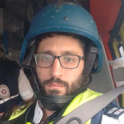 Under attack: Israel’s national EMS treat the wounded under fire.