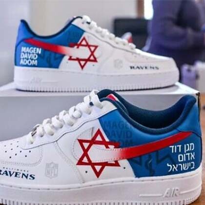 Ravens exec raises money for MDA with branded sneakers.