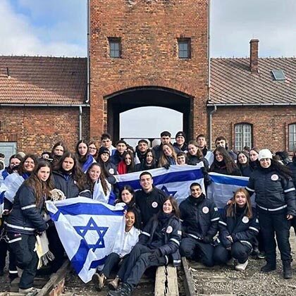 Dozens of MDA youth volunteers pay homage at Holocaust sites in Poland ahead of Yom HaShoah.