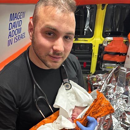 Three babies, two births, one MDA paramedic.